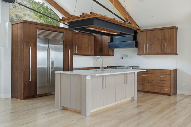 Kitchen with Sub-Zero refrigerator and island