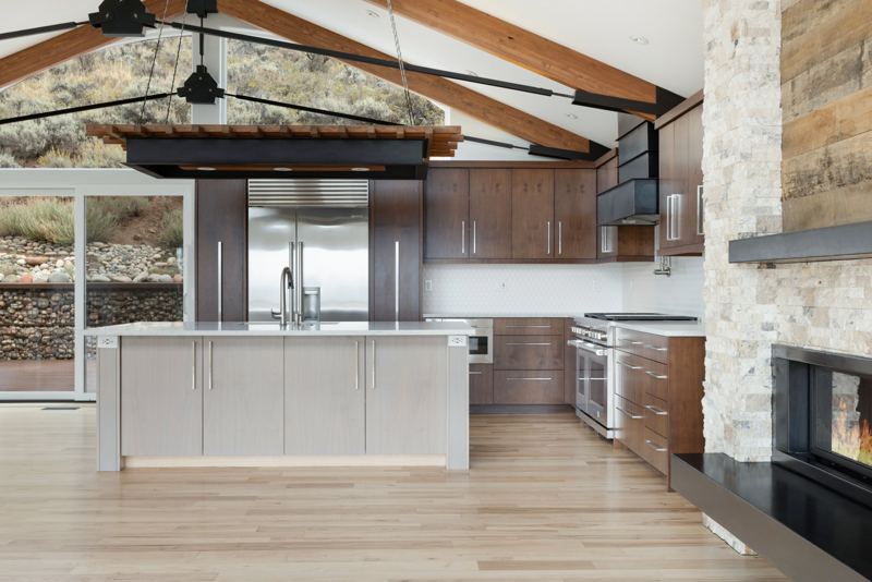 Kitchen with Wolf range and fireplace