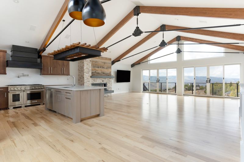 Kitchen opening to the great room and view windows