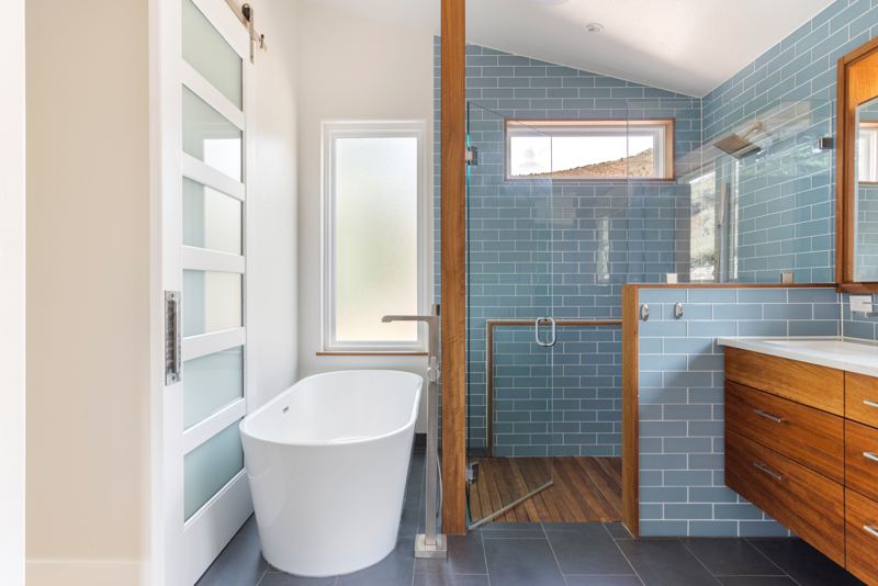 Freestanding soaking tub in the primary bath