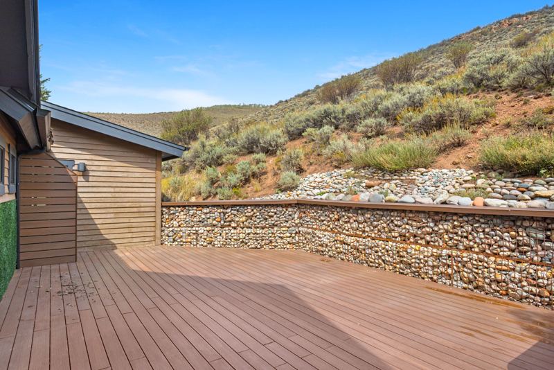 Backyard deck against the hillside