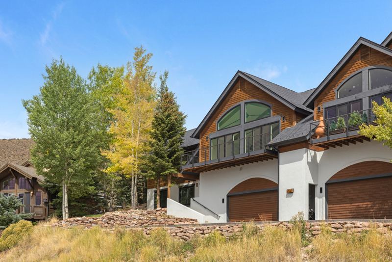 Exterior with two-car garage and mountain-style gables